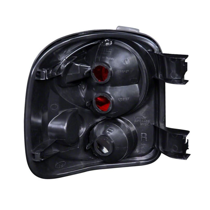 Raxiom 99-02 Chevrolet Silverado 1500 Stepside Axial Series Tail Lights- Black Housing- Clear Lens
