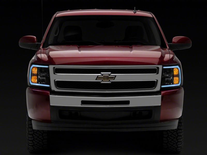 Raxiom 07-13 Chevrolet Silverado 1500 Axial Series Headlights w/ LED Bar- Black Housing (Clear Lens)