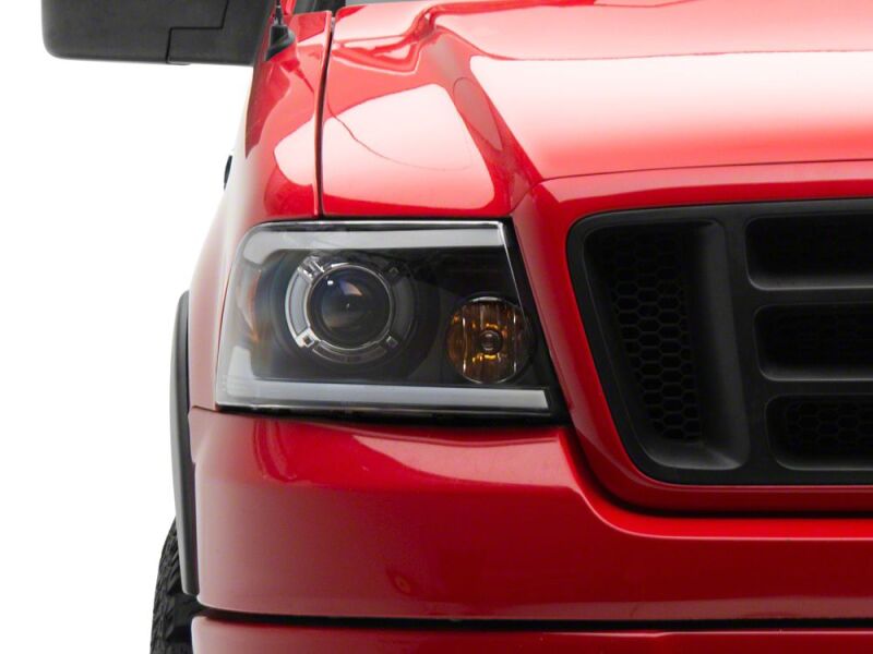 Raxiom 04-08 Ford F-150 Axial Series LED Proj Headlights/Seq LED Bar- Black- Clear Lens