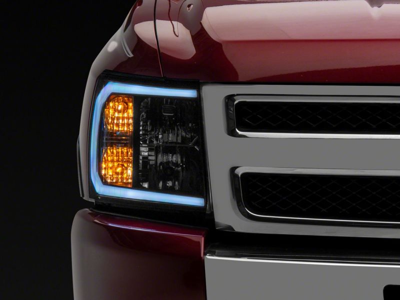Raxiom 07-13 Chevrolet Silverado 1500 Axial Series Headlights w/ LED Bar- Black Housing (Clear Lens)
