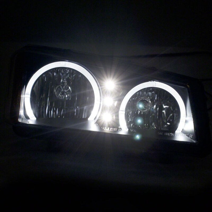 Raxiom 03-06 Chevrolet Silverado 1500 Dual LED Halo Projector Headlights- Black - Clear Lens